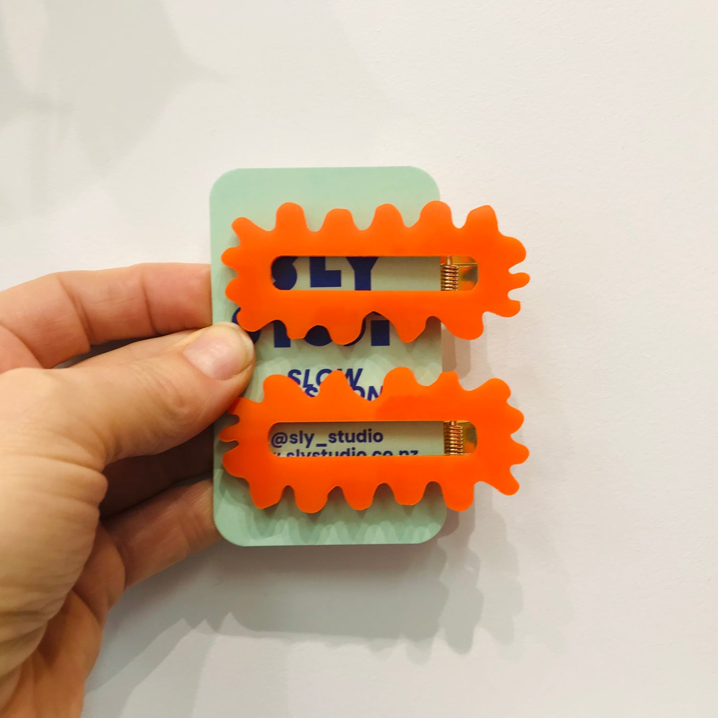 hairclips orange squiggle